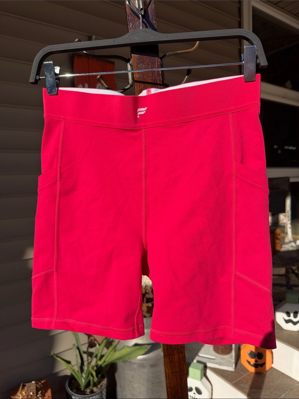 Fabletics On-The-Go PowerHold® High-Waisted 6" Short in Raspberry Fizz